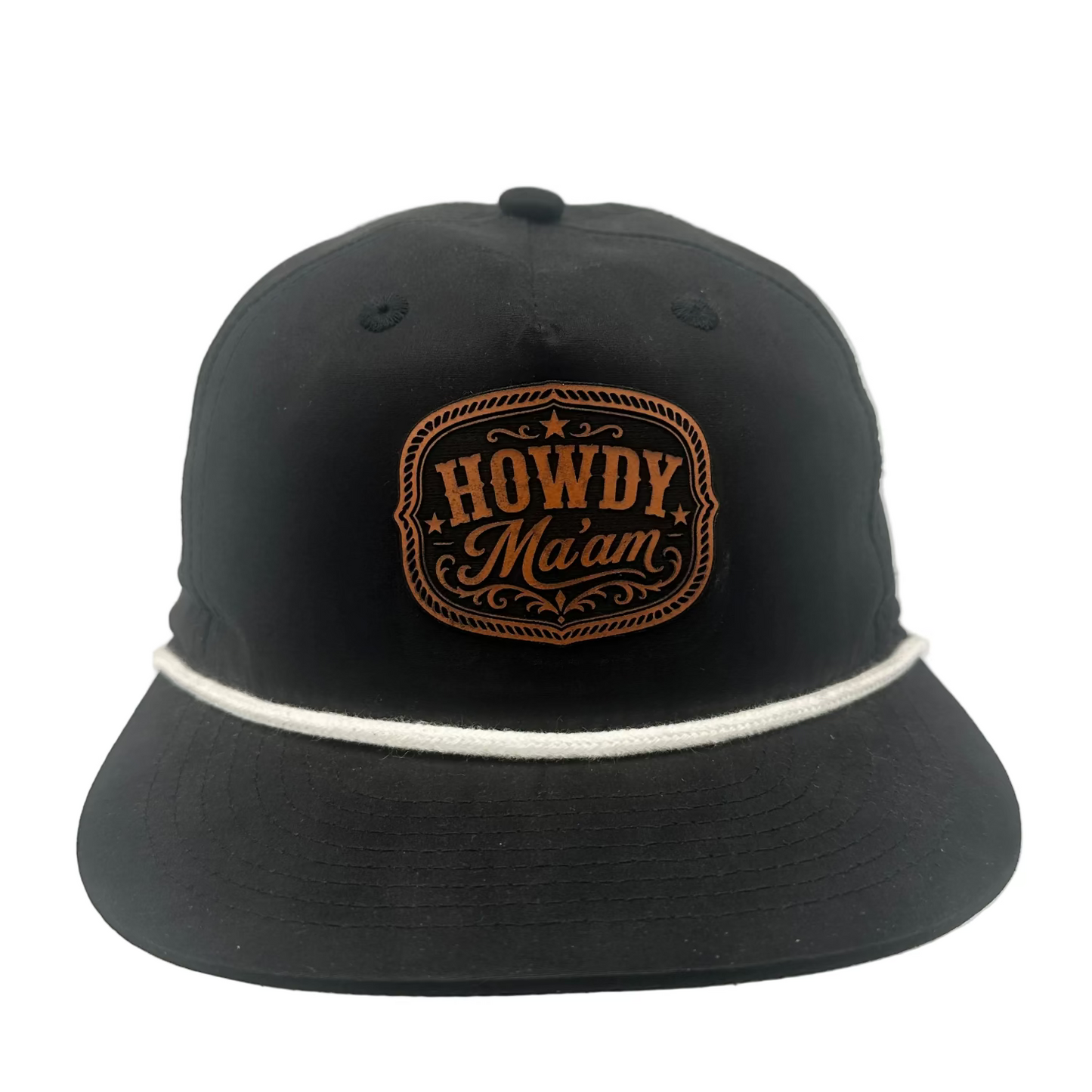 A black flat-brim baseball cap with a white stripe across the brim and a brown embroidered patch on the front that reads 'HOWDY Ma'am'.