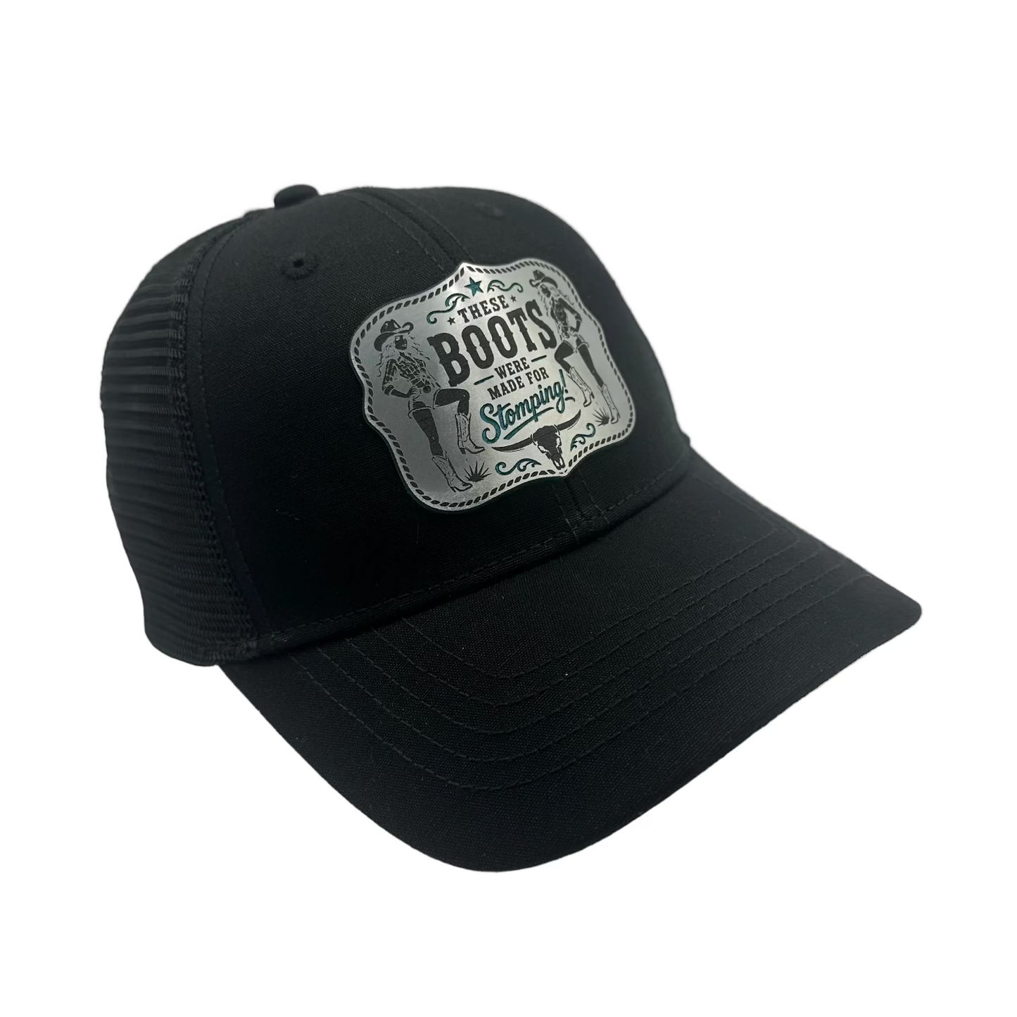 Black ponytail trucker hat with turquoise acrylic Western cowgirl patch reading These Boots Were Made for Stomping.