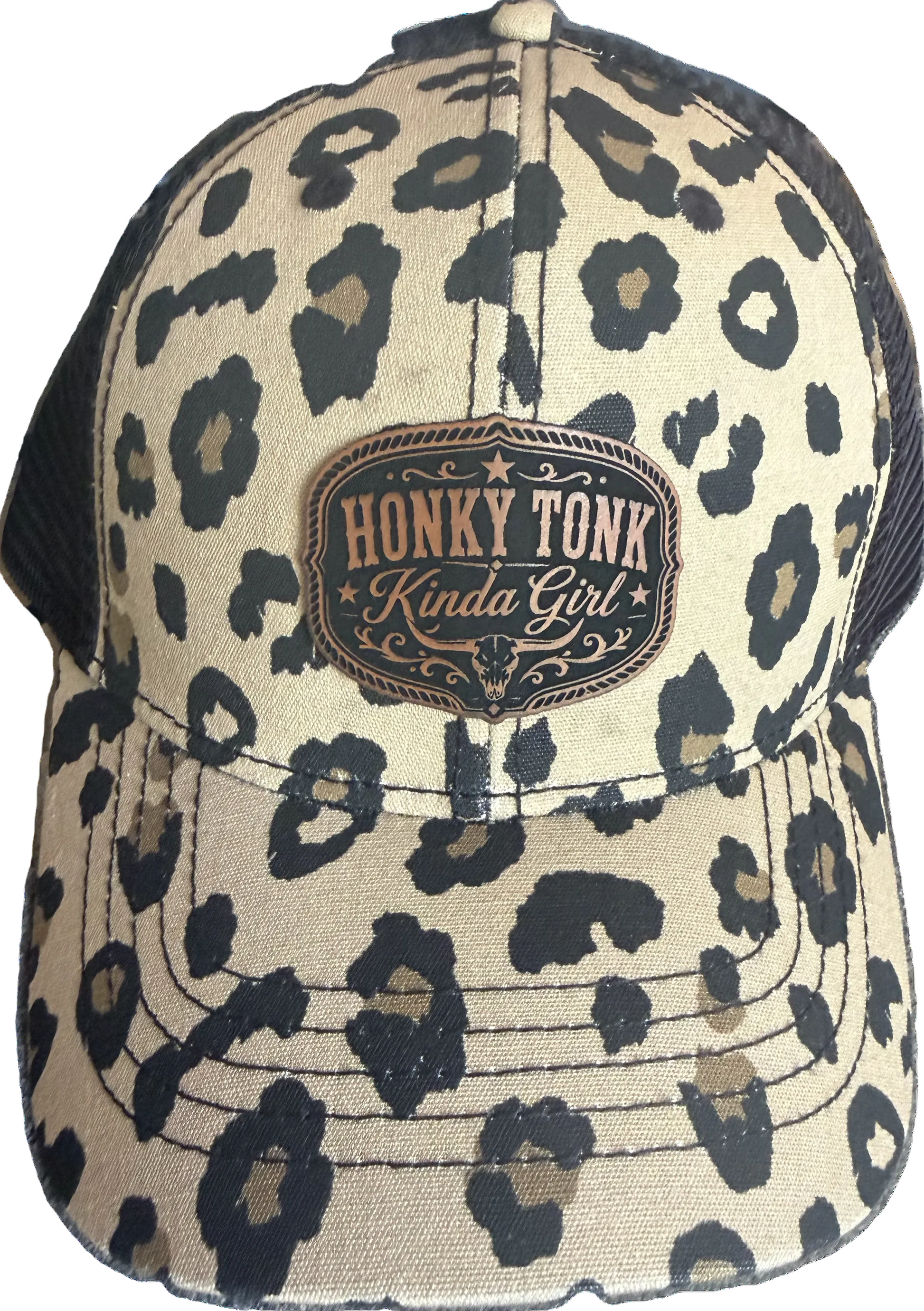 Honky Tonk Girl™ leopard print ponytail hat with premium laser engraved leather patch.